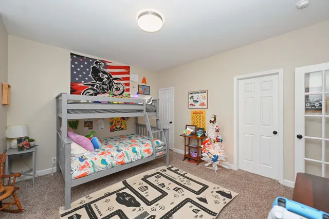 a bed room with furniture and a couch