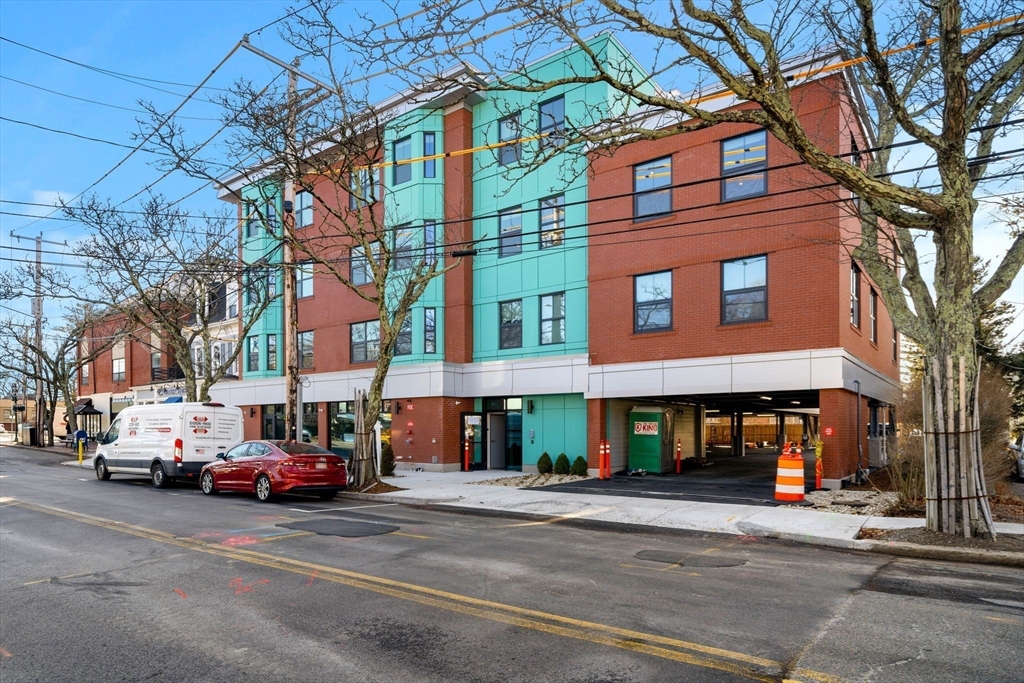 a view of a building with a street