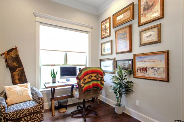 a workspace with furniture and a window