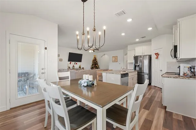 a view of a dining room with furniture