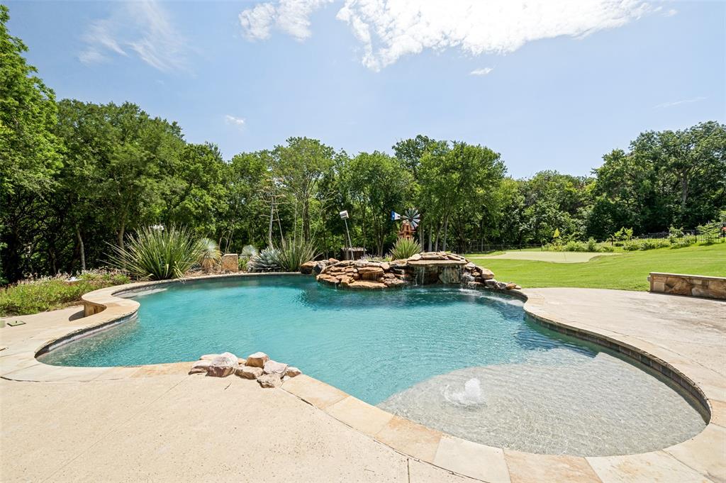 9 Country Ridge Road Melissa, TX 75454 - Photo 29 of 37 Custom pool with sundeck and waterfalls; the deepest is 6 ft.