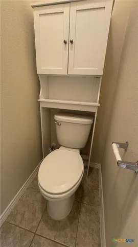 a close view of a toilet in bathroom