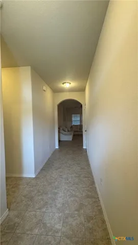 a view of a big room with a fireplace