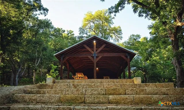 a black car in front of house