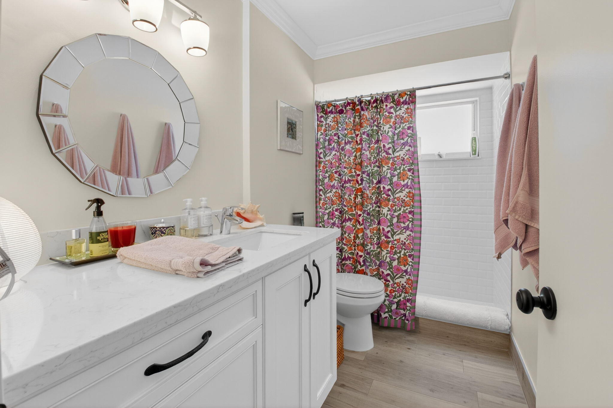 2702 Southwest 6th Street Boynton Beach, FL 33435 - Photo 28 of 49 a bathroom with a sink a toilet and a mirror