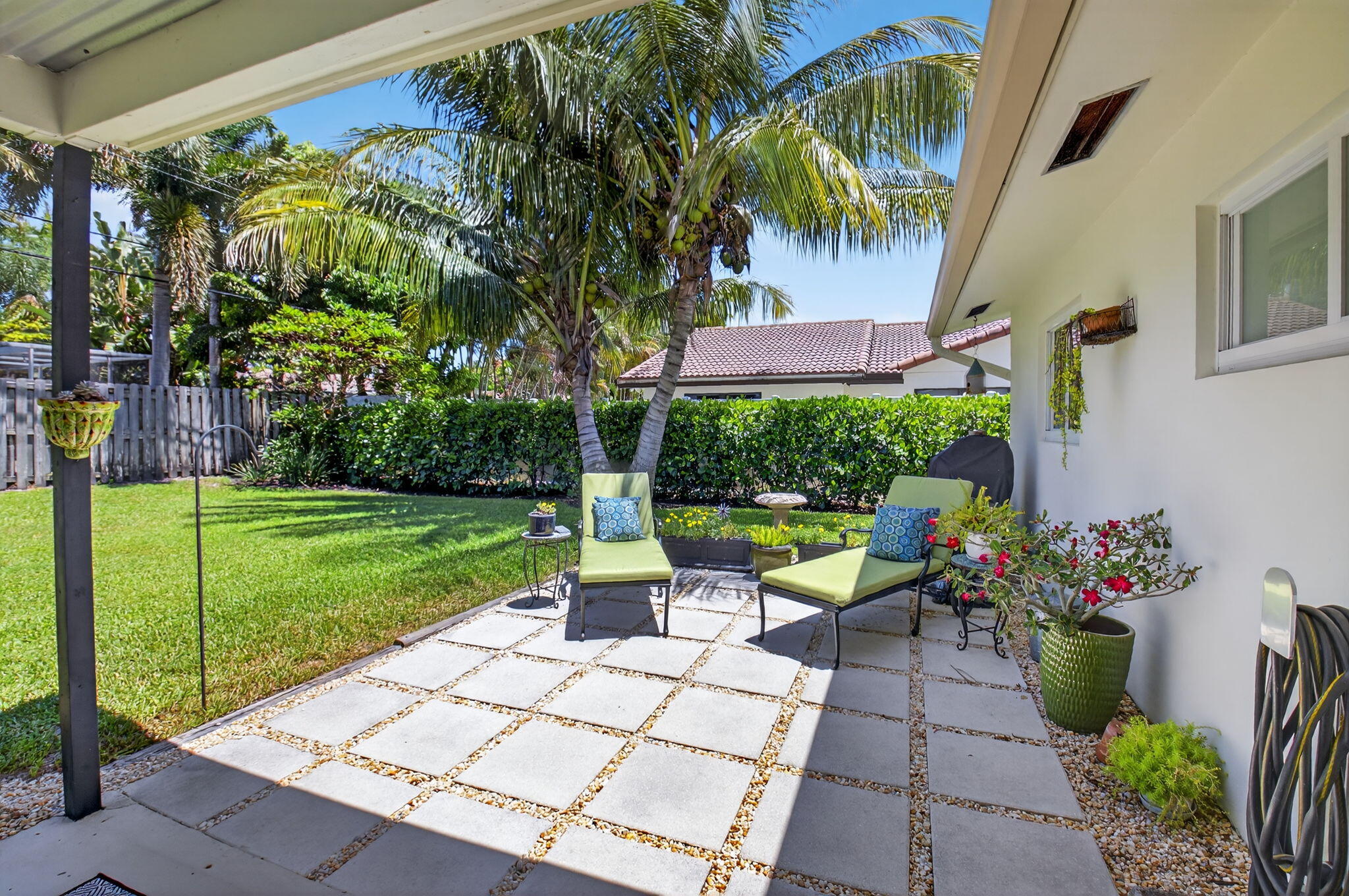 2702 Southwest 6th Street Boynton Beach, FL 33435 - Photo 31 of 49 a view of a garden with a patio