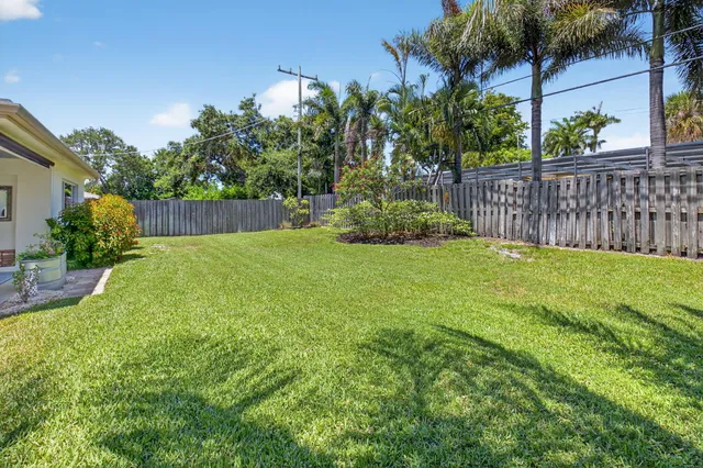 a view of a backyard with a garden