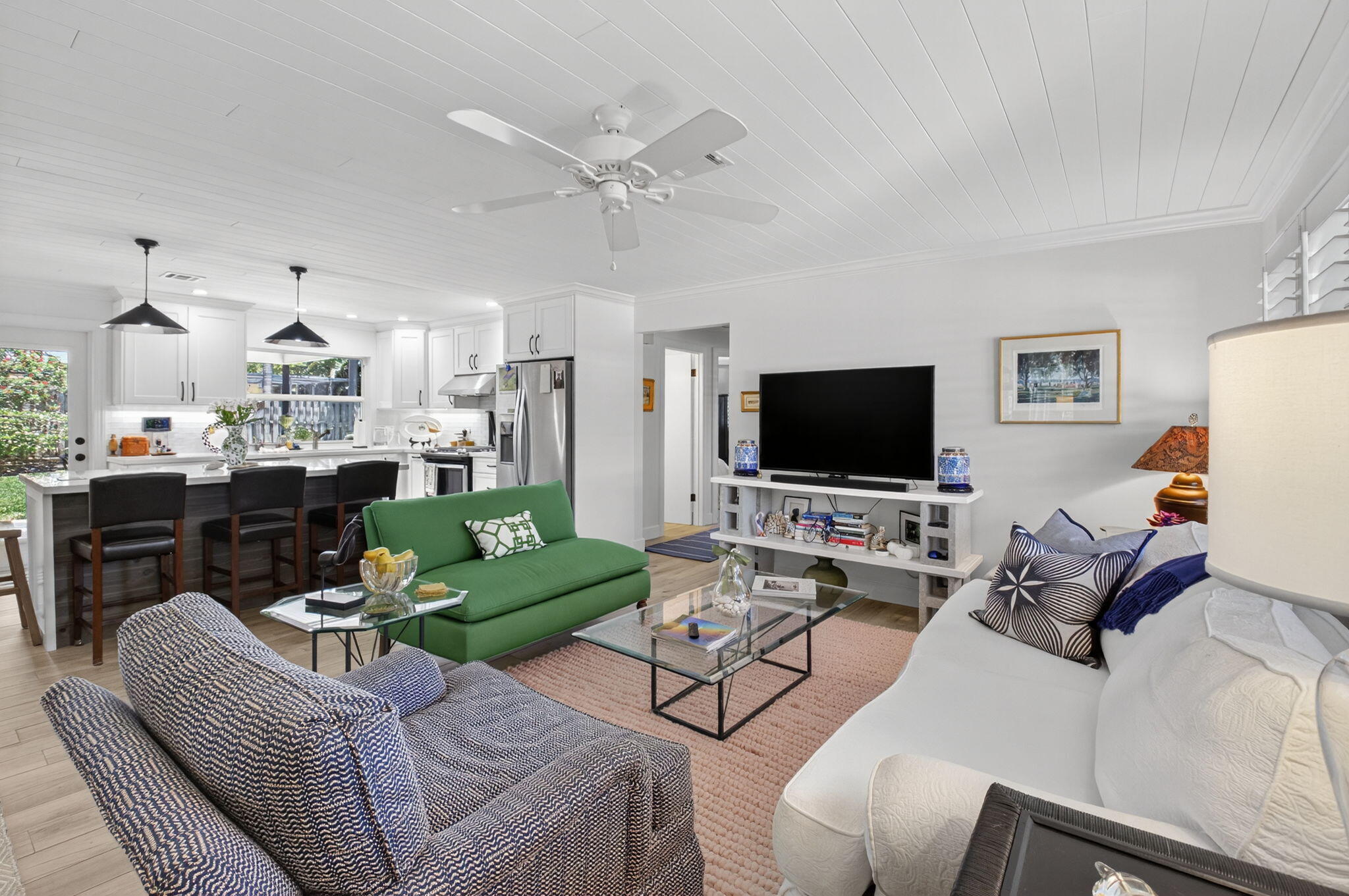 2702 Southwest 6th Street Boynton Beach, FL 33435 - Photo 4 of 49 a living room with furniture and a flat screen tv