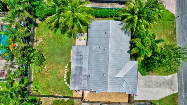 a aerial view of a house with garden