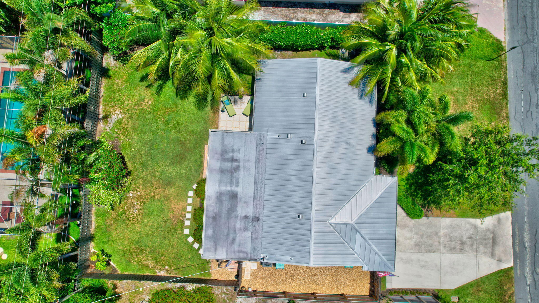 2702 Southwest 6th Street Boynton Beach, FL 33435 - Photo 45 of 49 a aerial view of a house with garden