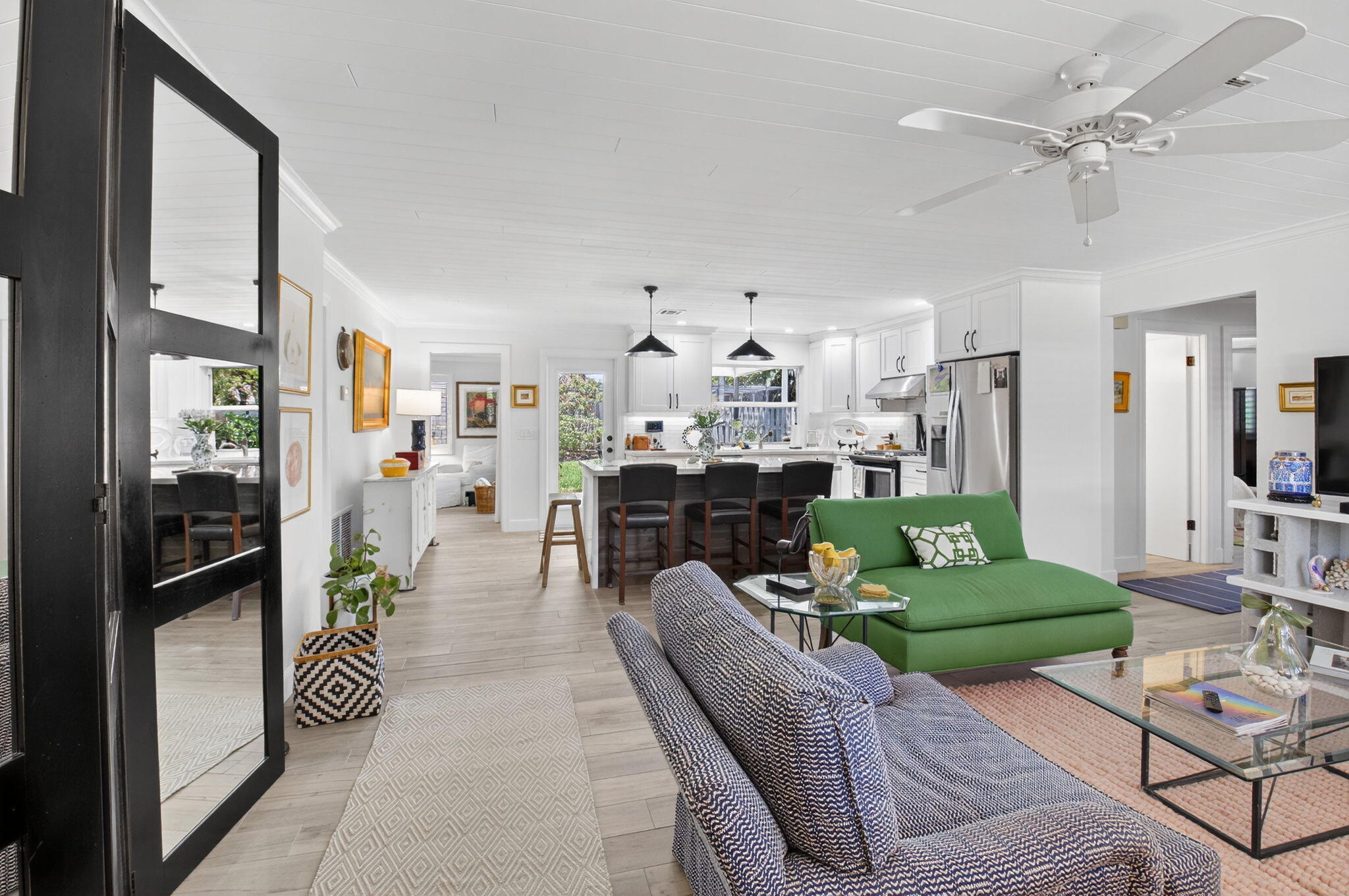 2702 Southwest 6th Street Boynton Beach, FL 33435 - Photo 5 of 49 a living room with furniture and a chandelier