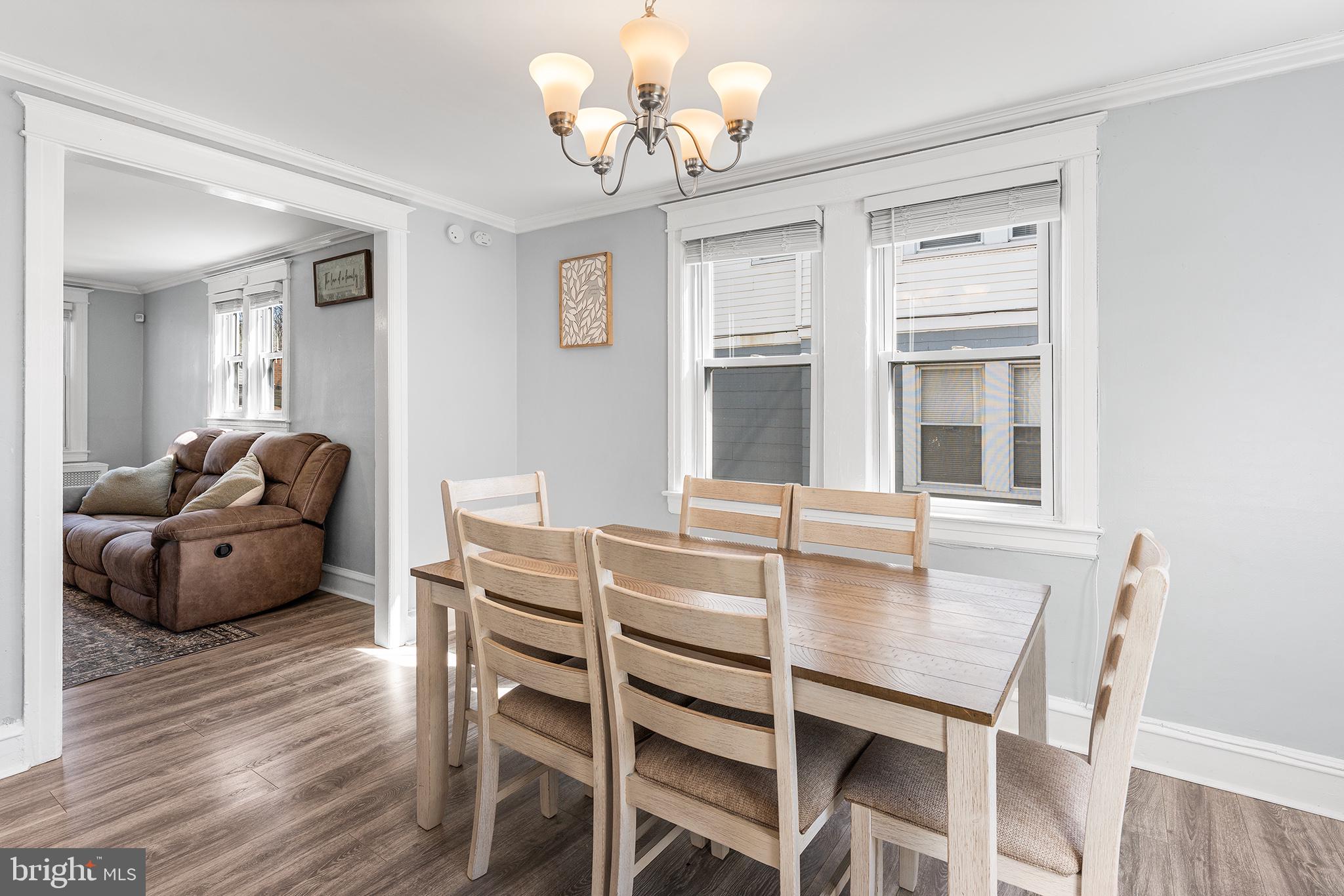 424 Cypress Street Lansdowne, PA 19050 - Photo 11 of 32 a living room with furniture dining table and wooden floor