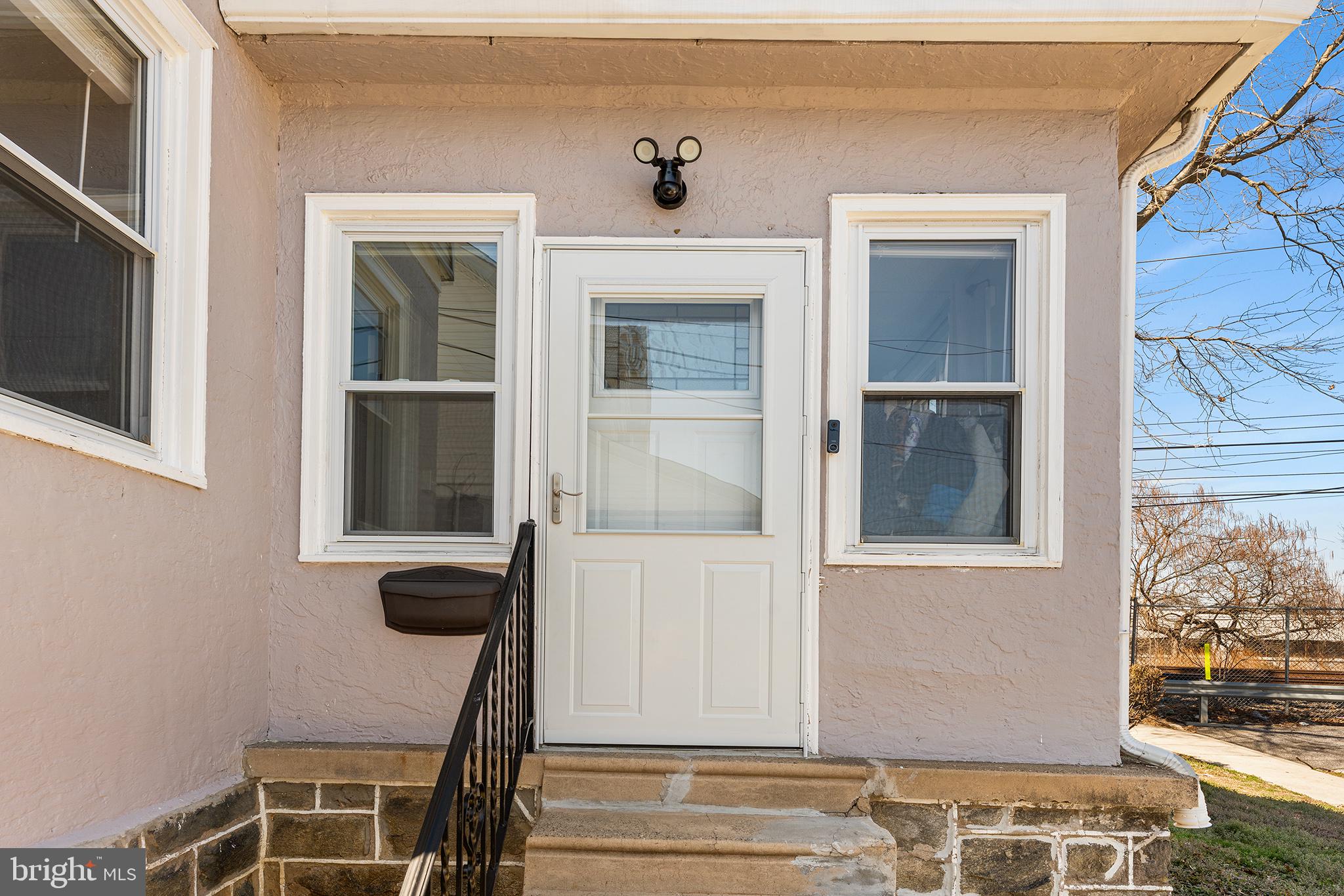 424 Cypress Street Lansdowne, PA 19050 - Photo 3 of 32 a front view of a house with a window