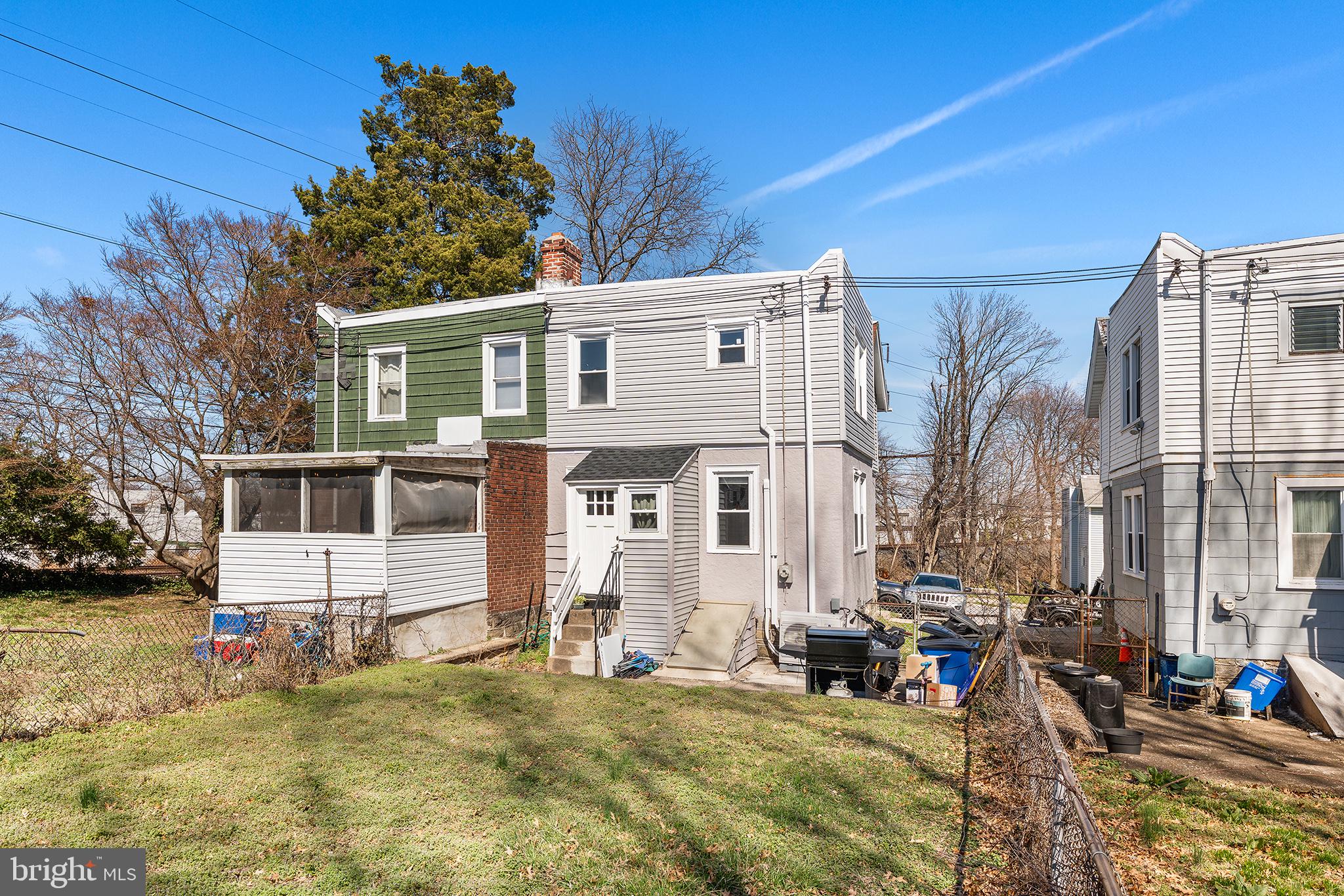 424 Cypress Street Lansdowne, PA 19050 - Photo 31 of 32 a front view of a house with a yard