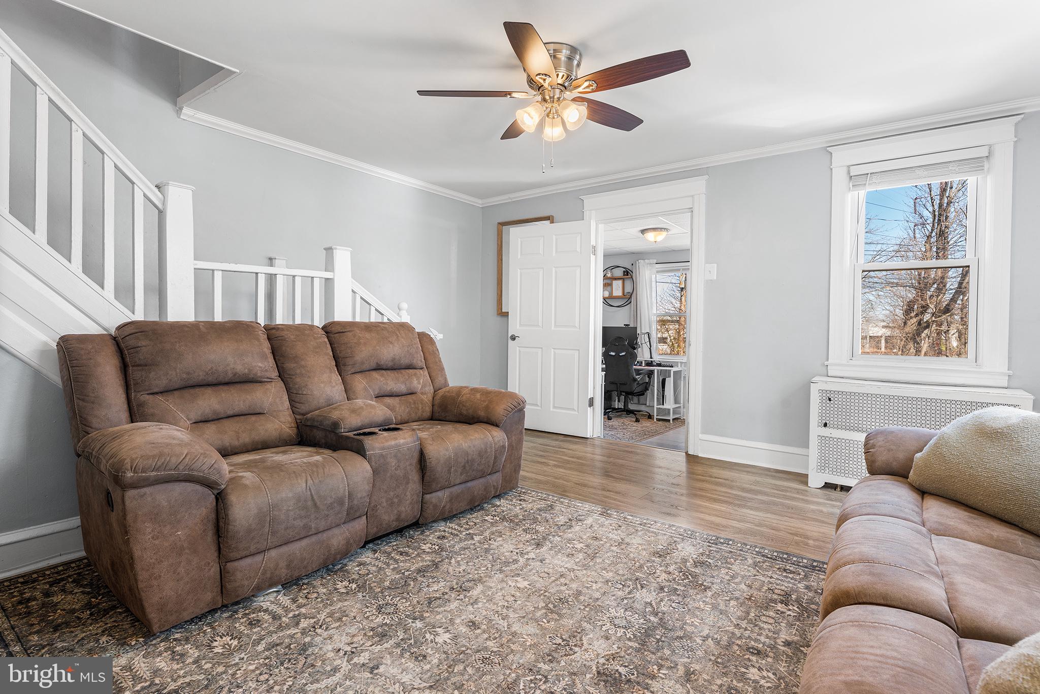 424 Cypress Street Lansdowne, PA 19050 - Photo 6 of 32 a living room with furniture and a wooden floor