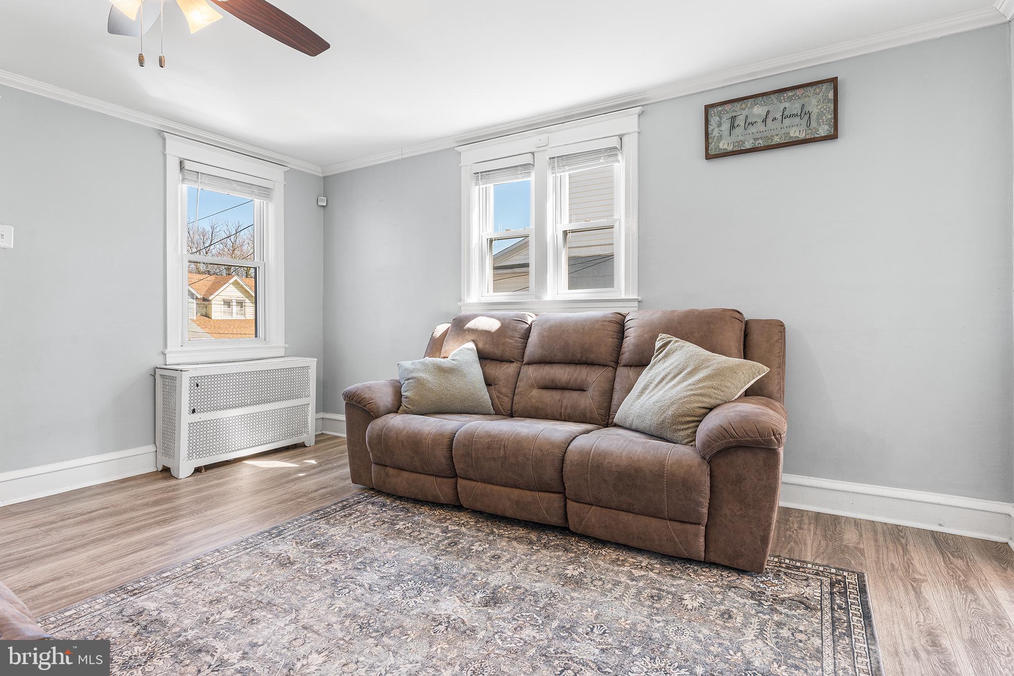 424 Cypress Street Lansdowne, PA 19050 - Photo 7 of 32 a living room with furniture and a window