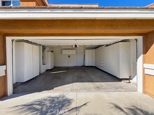 15252 Riviera Lane La Mirada, CA 90638 - Photo 17 of 18 a view of garage with a dishwasher and a dresser