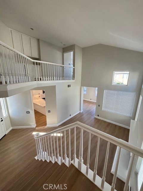 15252 Riviera Lane La Mirada, CA 90638 - Photo 8 of 18 a view of staircase with furniture and wooden floor