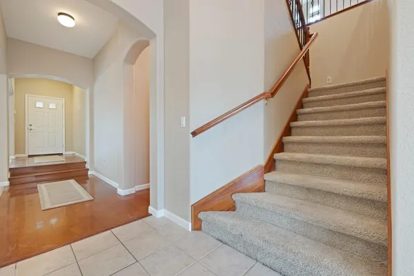 a view of a hallway with windows