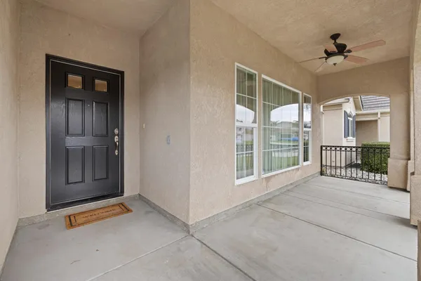 a view of a room with a large window