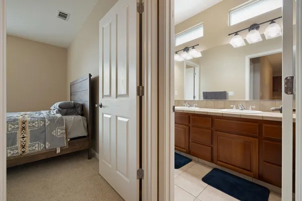 a swimming pool with wooden fence