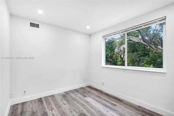 an empty room with a window