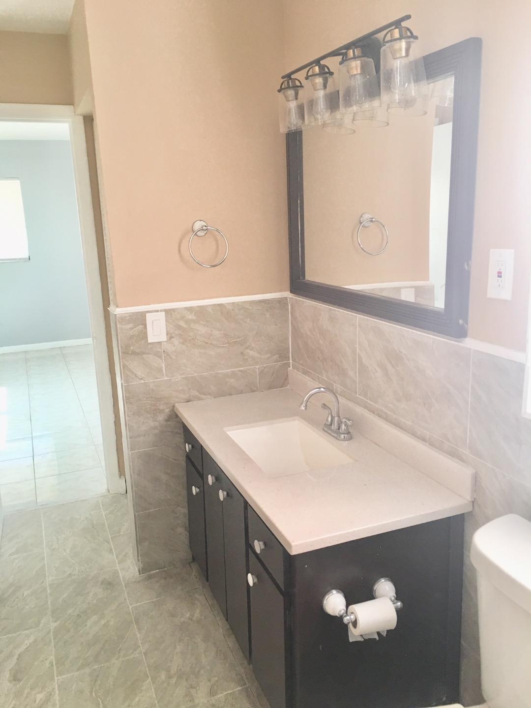 1647 West 17th Street Riviera Beach, FL 33404 - Photo 3 of 15 1647 17 master bath 2