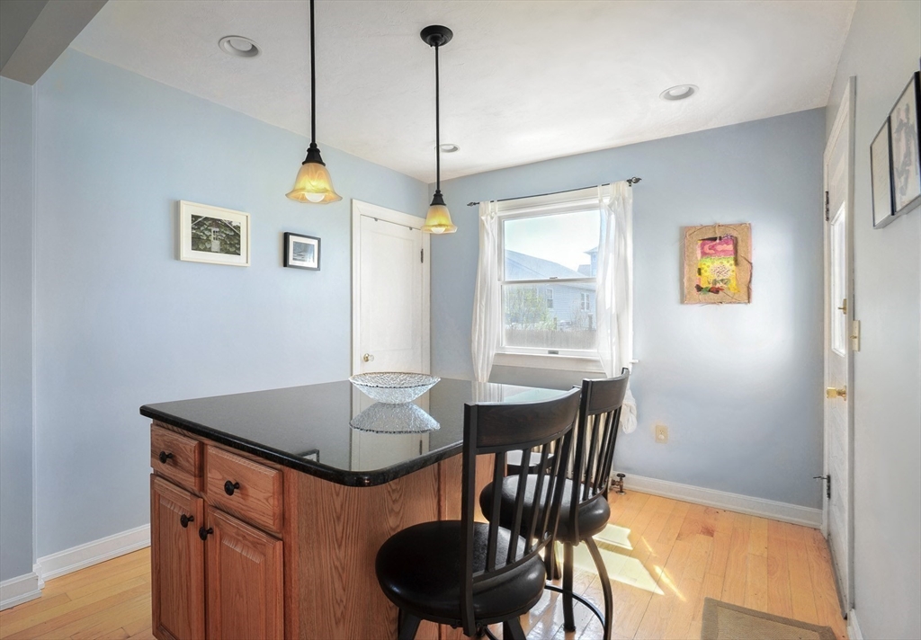 12 L Street Hull, MA 02045 - Photo 11 of 29 a dining room with furniture and window