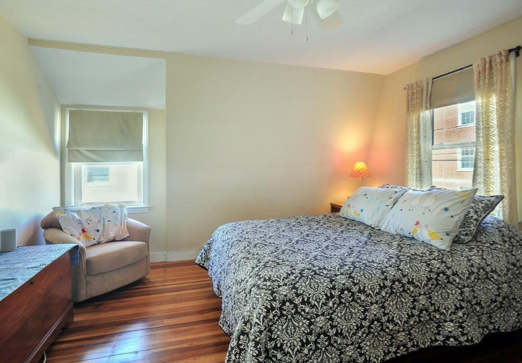 12 L Street Hull, MA 02045 - Photo 14 of 29 a bedroom with a bed and a couch