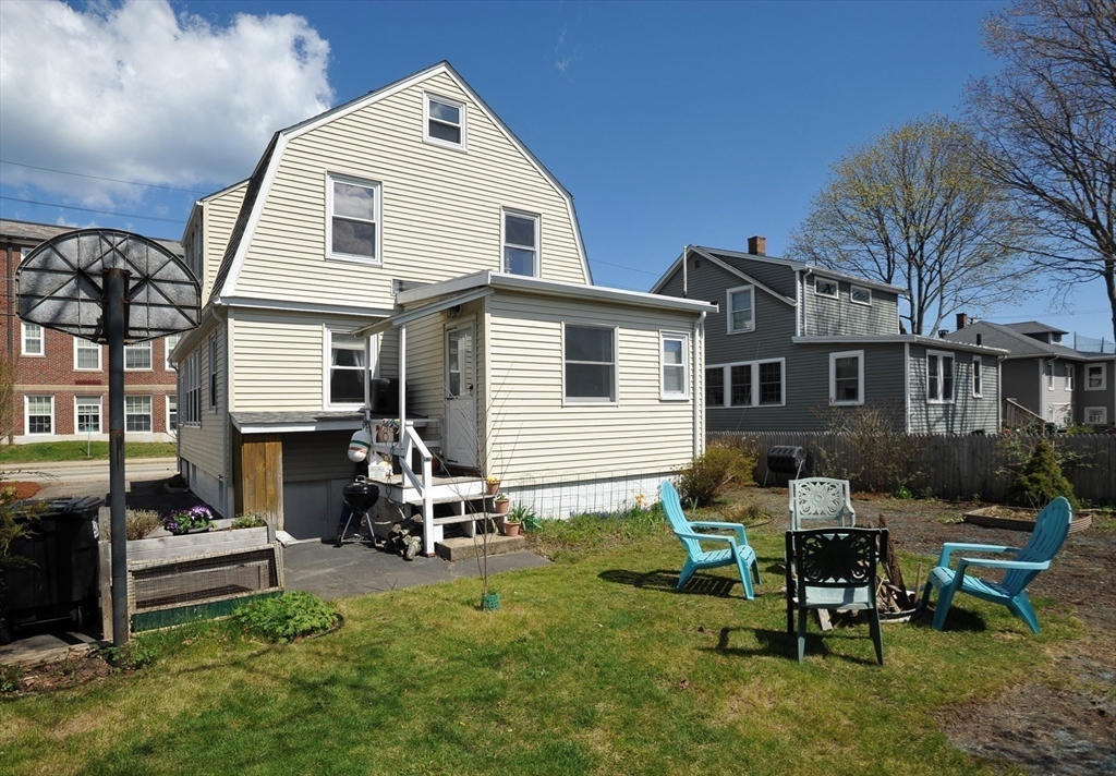 12 L Street Hull, MA 02045 - Photo 23 of 29 a view of a house with backyard and sitting area