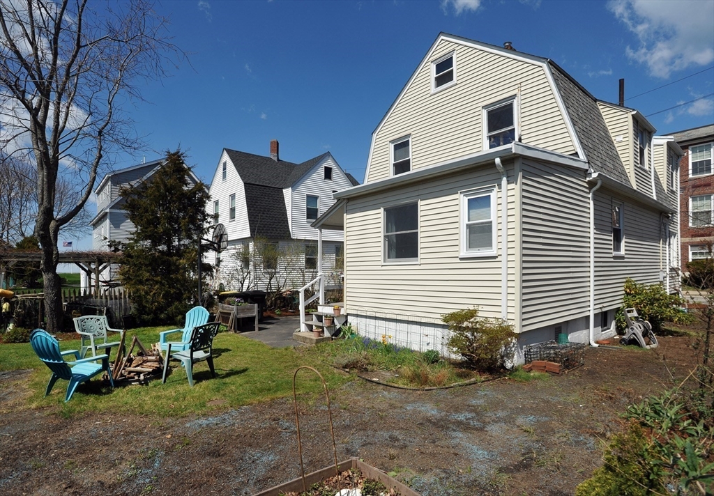 12 L Street Hull, MA 02045 - Photo 27 of 29 a view of a house with a yard and sitting area