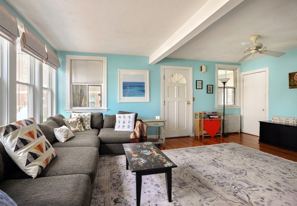 12 L Street Hull, MA 02045 - Photo 5 of 29 a living room with furniture and a flat screen tv