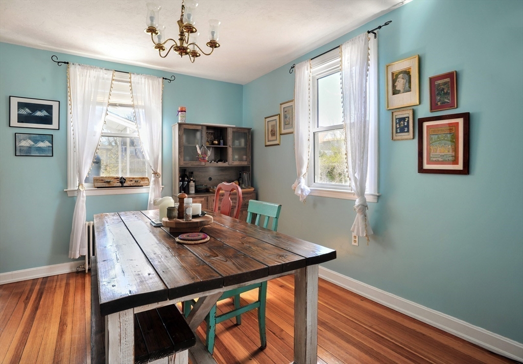 12 L Street Hull, MA 02045 - Photo 7 of 29 a view of a dining room with furniture window and wooden floor