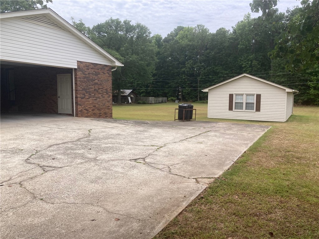 304 Tillotson Road Anderson, SC 29621 - Photo 23 of 29 Ouside double car garage and drive way