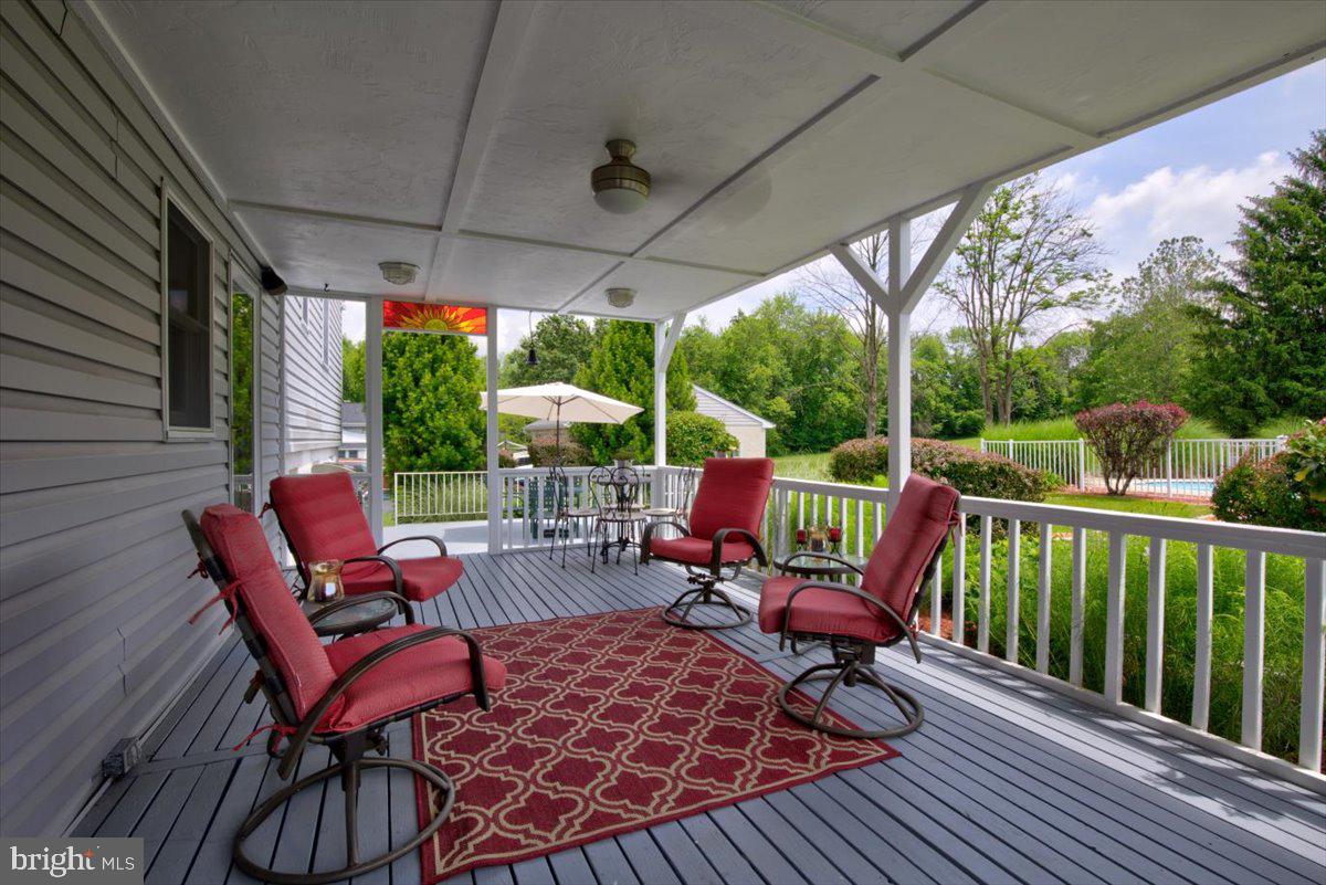 1220 South Rapps Dam Road Phoenixville, PA 19460 - Photo 8 of 44 Freshly painted deck - and the chairs stay!