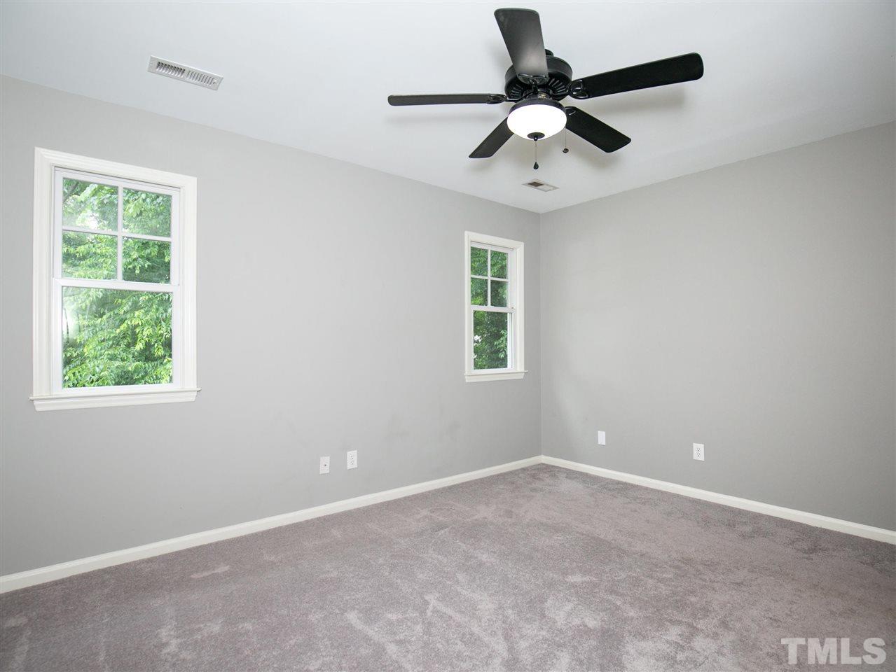 2542 Noble Road Raleigh, NC 27608 - Photo 17 of 27 a view of an empty room with a window