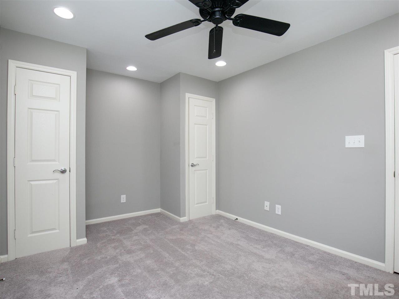 2542 Noble Road Raleigh, NC 27608 - Photo 23 of 27 a view of an empty room and chandelier fan