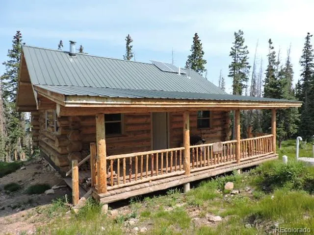 a view of a roof deck with wooden fence