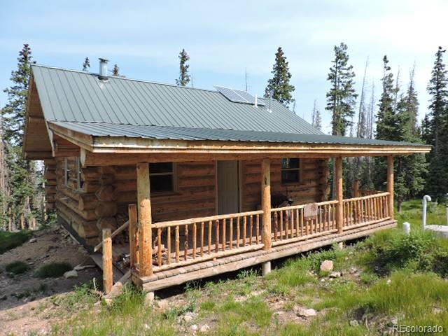 a view of a roof deck with wooden fence