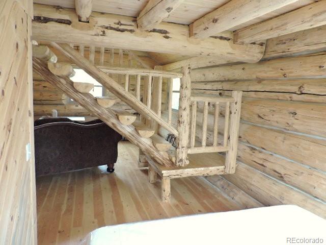 6548 Giesse Road San Luis, CO 81152 - Photo 28 of 45 a view of entryway and hall with wooden floor