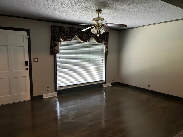 a view of a storage & utility room with wooden floor