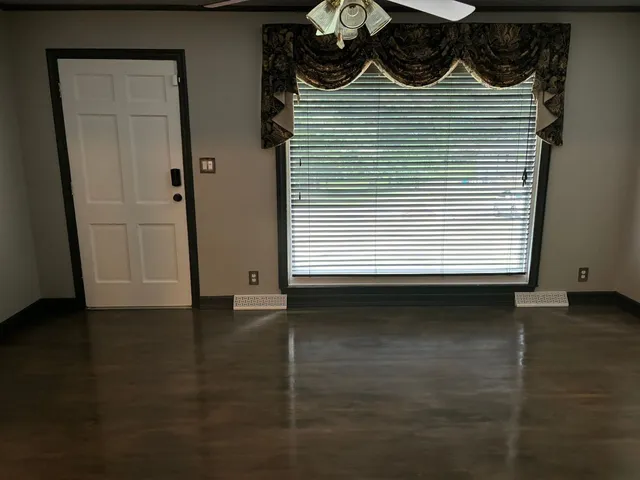 a view of a front door and a window