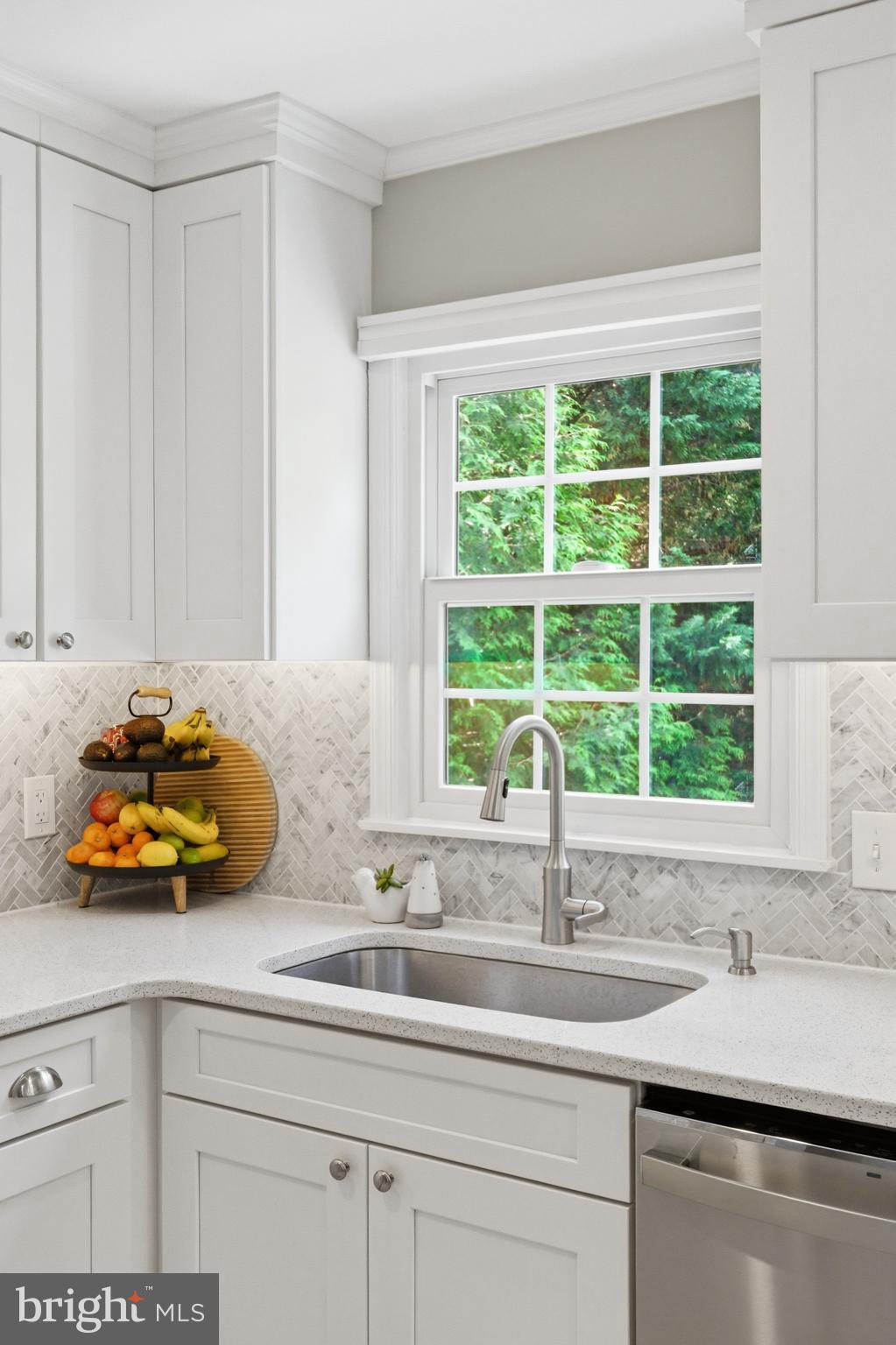 6445 Linway Terrace McLean, VA 22101 - Photo 13 of 46 a kitchen with a sink and a window