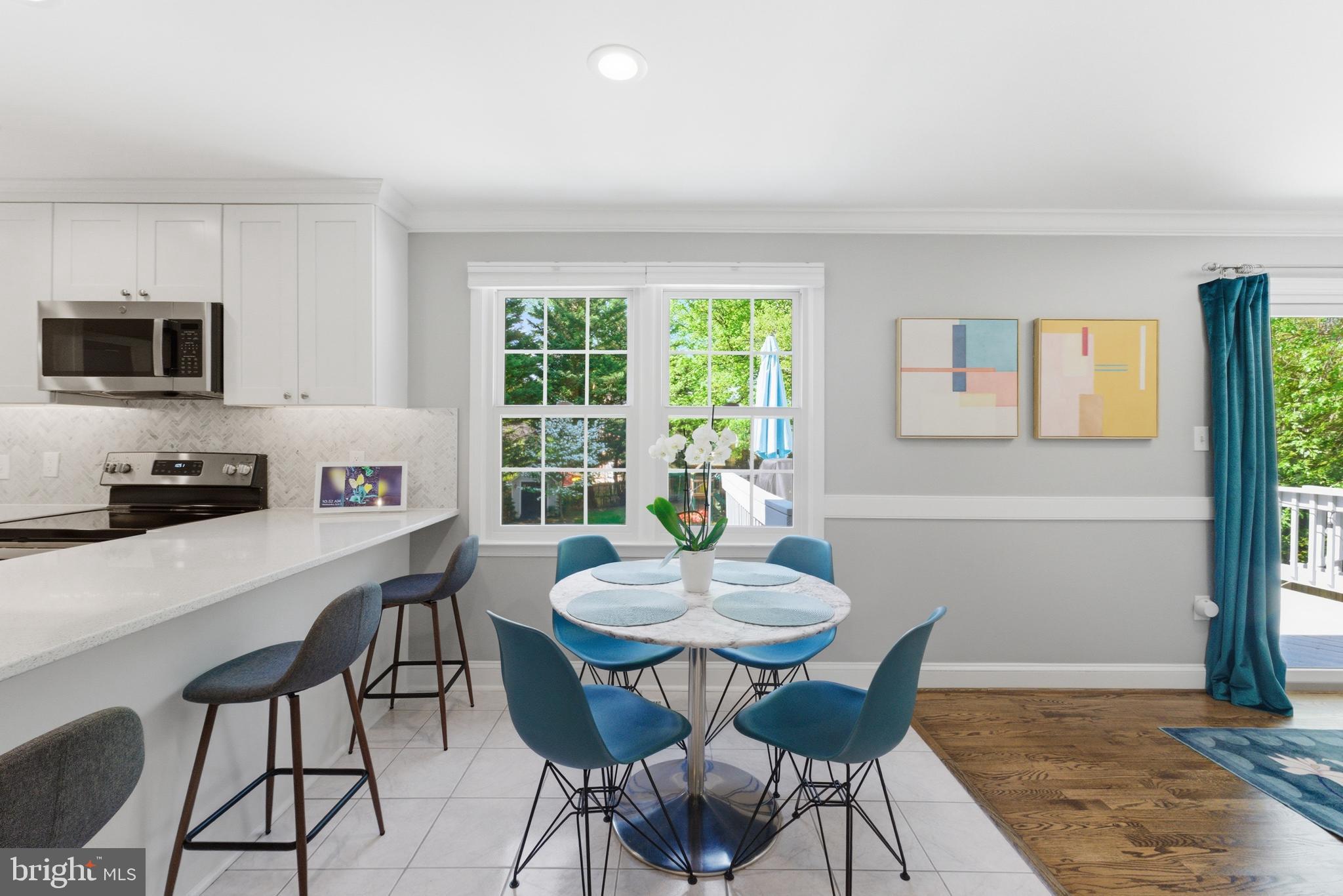 6445 Linway Terrace McLean, VA 22101 - Photo 17 of 46 a view of a dining room with furniture window and outside view