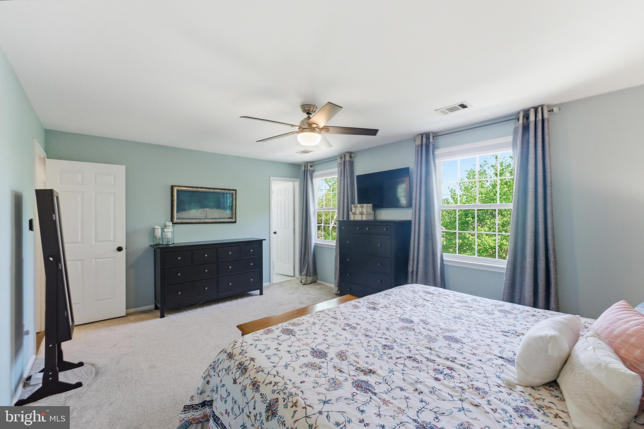 6445 Linway Terrace McLean, VA 22101 - Photo 26 of 46 a bedroom with a bed and a dresser