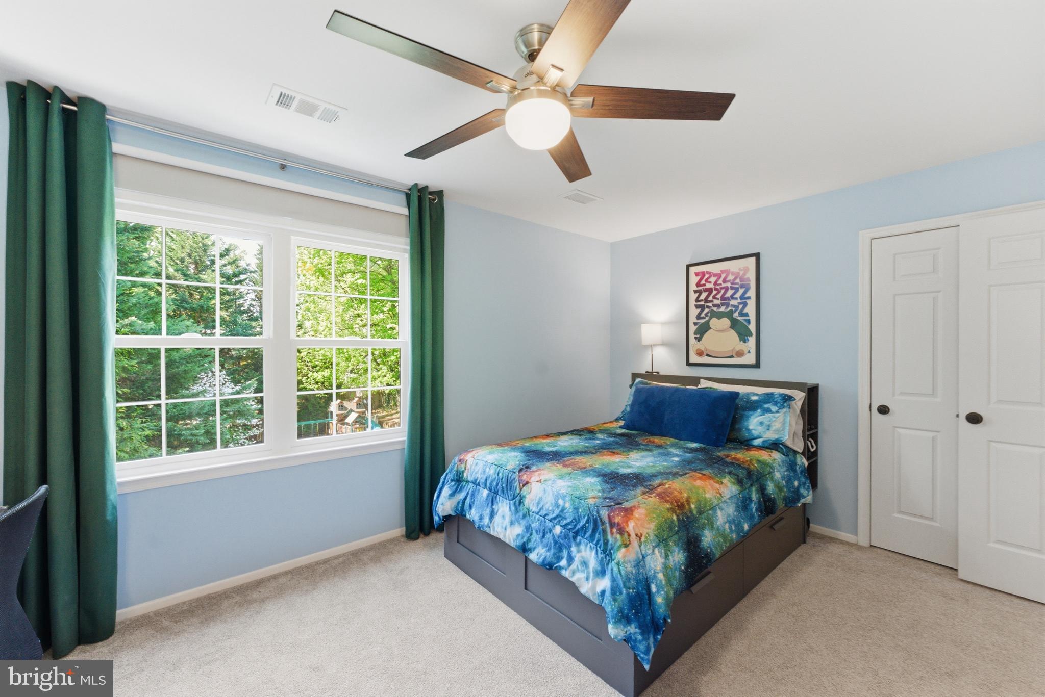 6445 Linway Terrace McLean, VA 22101 - Photo 29 of 46 a bedroom with a bed and a window