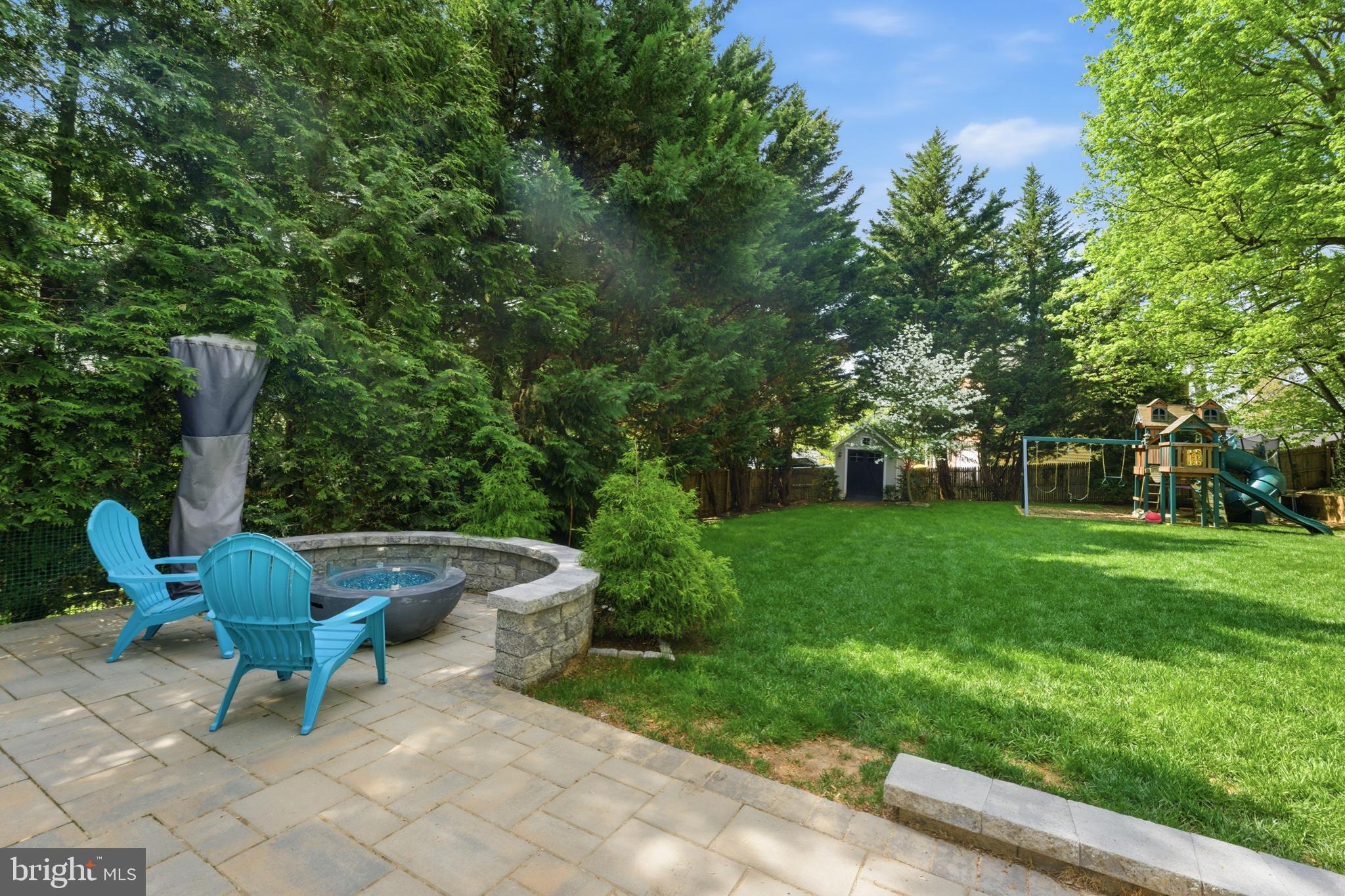 6445 Linway Terrace McLean, VA 22101 - Photo 3 of 46 a view of a chair and table in the garden