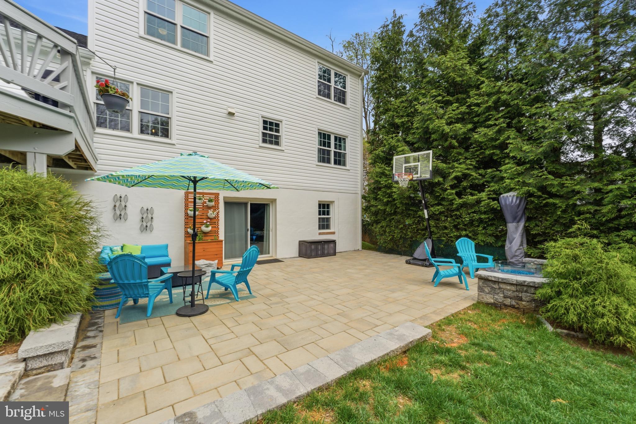 6445 Linway Terrace McLean, VA 22101 - Photo 6 of 46 a view of a house with backyard sitting area and garden