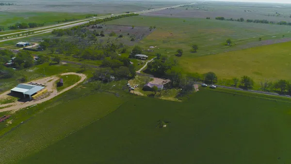 a view of a lake from a yard