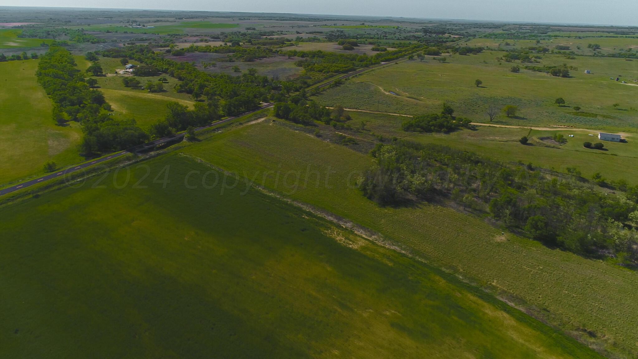 Long Dry Creek Shamrock, TX 79079 - Photo 4 of 13 a view of a lake with a city